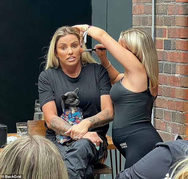 Katie Price Puts On An Animated Display As She Gets Her Make Up Done At