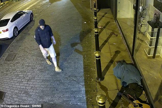 Heartless Thief Steals A Homeless Buskers Guitar As The Man Sleeps In