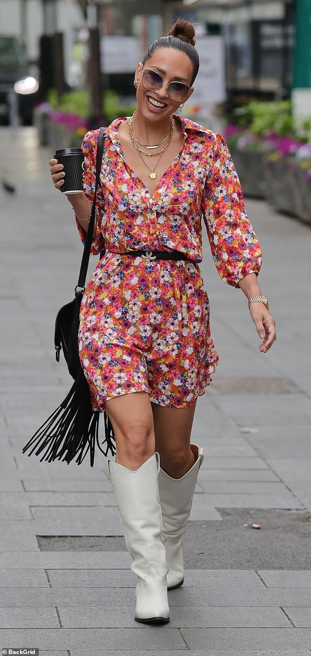 Myleene Klass nails western chic in a low-cut leggy dress and knee high