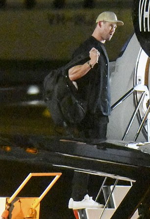 Chris Hemsworth and wife Elsa Pataky are spotted boarding a private jet