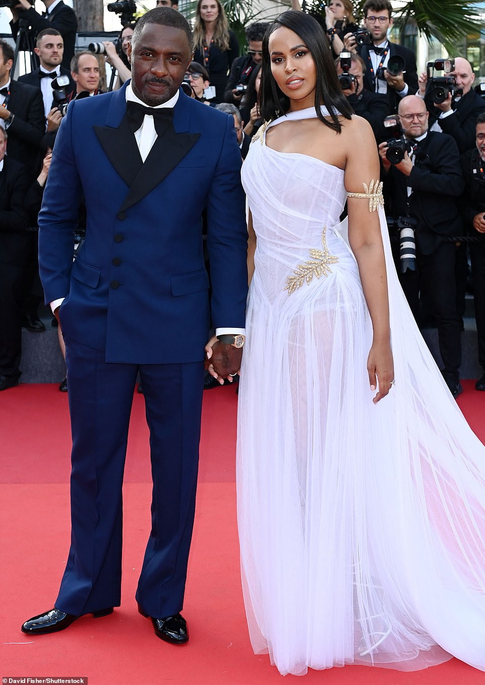 Idris Elba puts on a loved-up display with wife Sabrina at Three ...