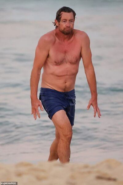 Shirtless Simon Baker 52 Looks Freezing As He Goes For A Swim And