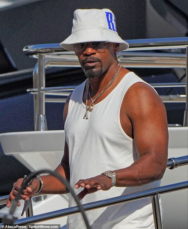 Jamie Foxx Shows Off His Impressive Biceps As He Enjoys A Luxury