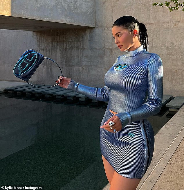 Kylie Jenner Displays Her Sexy Curves In A Metallic Blue Ribbed Top And Miniskirt While On 