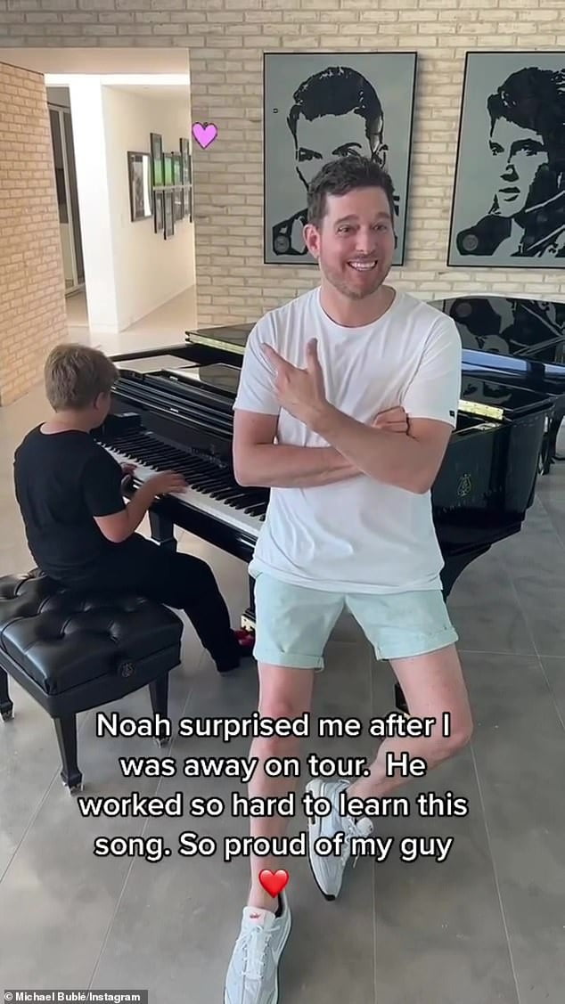 Michael Bublé chokes back tears as son Noah, 8, surprises him by
