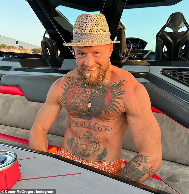Shirtless Conor Mcgregor Playfully Flexes His Muscles During Ibiza Getaway Sound Health And