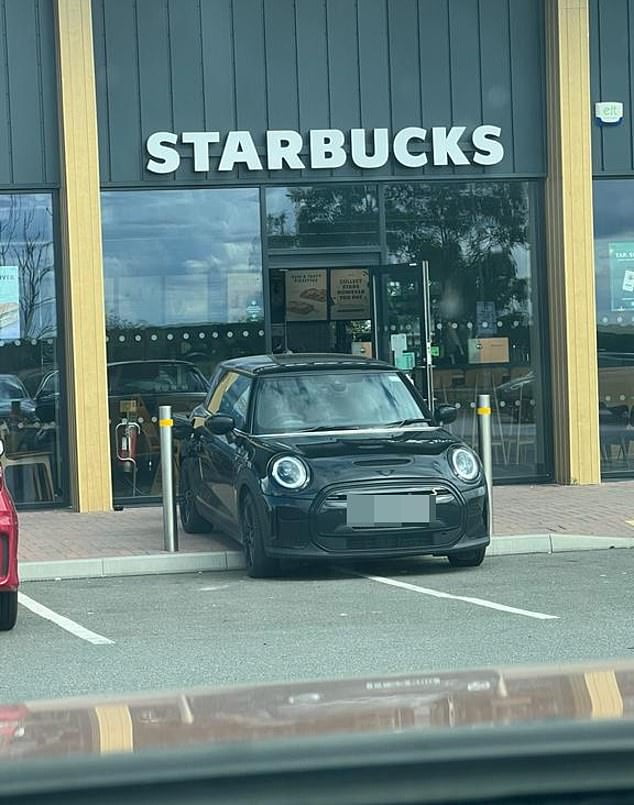 Electric Mini Cooper has to charge up in motorway Starbucks after car