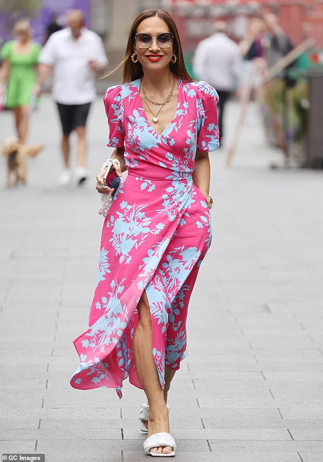 Myleene Klass wows in a fuchsia floral wrap dress as she leaves the ...