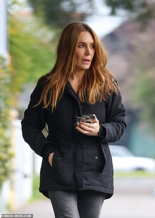 Olivia NewtonJohn's niece Tottie Goldsmith looks downcast as she steps out in Melbourne Sound