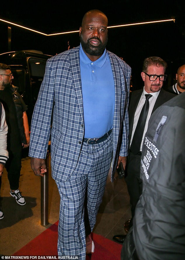 Shaquille O'Neal sports checked suit as he strolls through Sydney bar