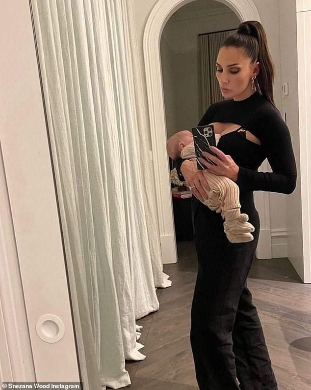 Snezana Wood looks glamorous as she breastfeeds newborn daughter Harper ...
