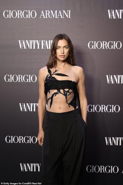 Irina Shayk Flashes Her Washboard Abs In A Sheer Black Top As She