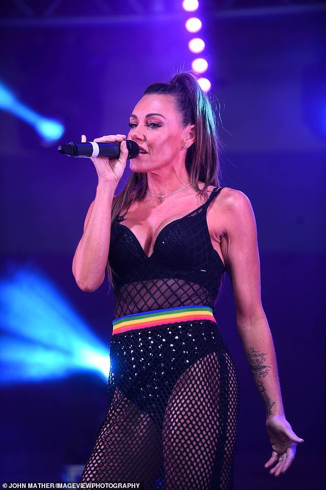 Michelle Heaton Shows Off Her Figure In A Daring Black Mesh Dress On Stage With Liberty X