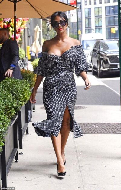 Nicole Scherzinger has wardrobe malfunction and reveals nipple cover on