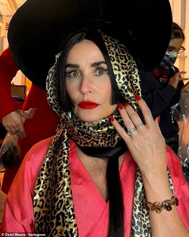 Demi Moore looks youthful dressed in character... two weeks before her