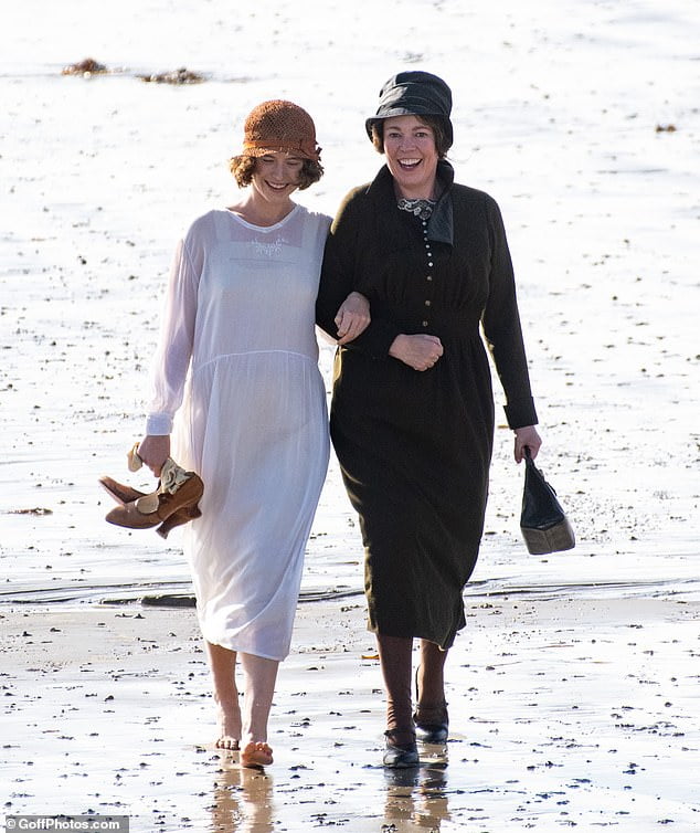 Olivia Colman and Jessie Buckley frolick around on the beach on set of ...