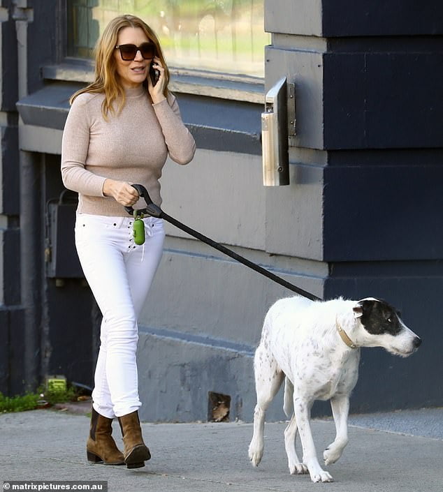 Tottie Goldsmith walks her dog in St Kilda and takes selfies in the park Sound Health and