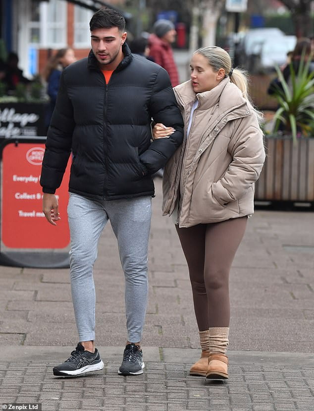 Pregnant Molly-Mae Hague steps out in a cosy all-beige outfit covering