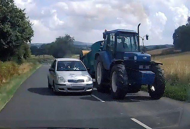 Watch moment reckless driver attempts to overtake tractor on blind ...