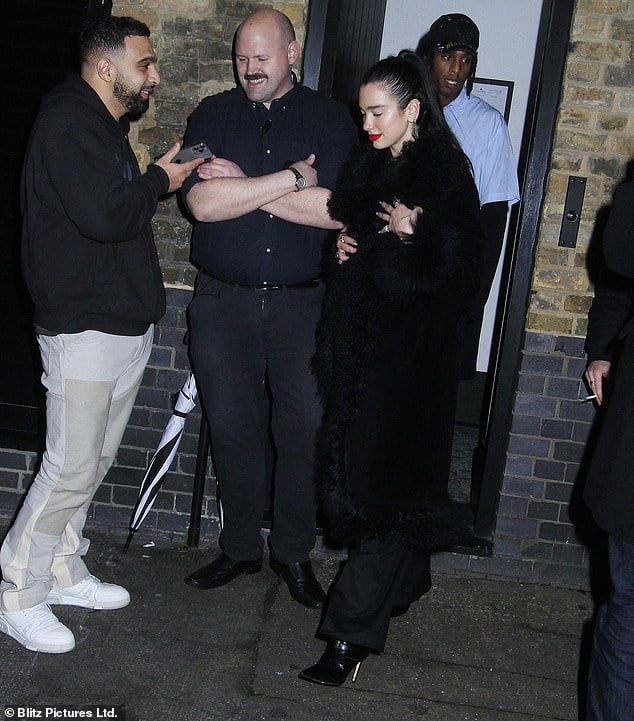 Dua Lipa enjoys an evening at the Chiltern Firehouse with friends