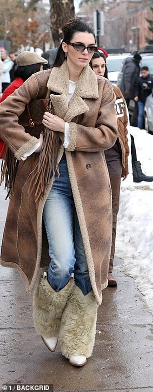 Kendall Jenner nails winter chic in faux fur cowboy boots while sister ...