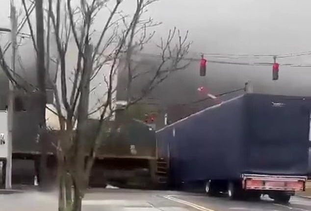 Heart-stopping Moment Freight Train Slams Into A Tractor-trailer Stuck ...