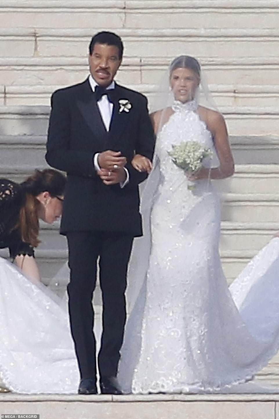 sofia-richie-is-walked-down-the-aisle-by-dad-lionel-during-lavish-wedding-ceremony-to-elliot