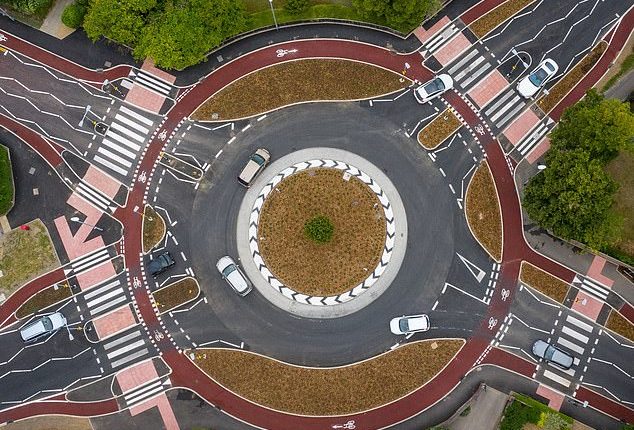 UK's first Dutch-style roundabout which gives cyclists priority sees ...