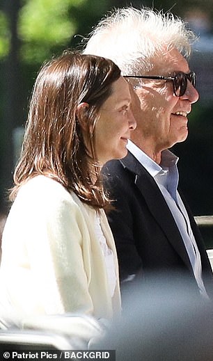 Harrison Ford and Calista Flockhart look stylish as they watch son Liam graduate from college