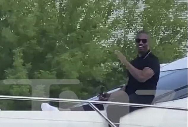 PICTURED: Jamie Foxx seen smiling and waving to fans on a boat while ...