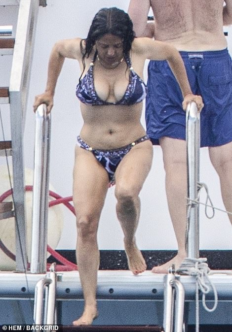 EXCLUSIVE Salma Hayek Puts On Busty Display In A Skimpy Blue Bikini As She Cools Down In