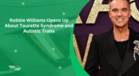 Robbie Williams Opens Up About Tourette Syndrome and Autistic Traits